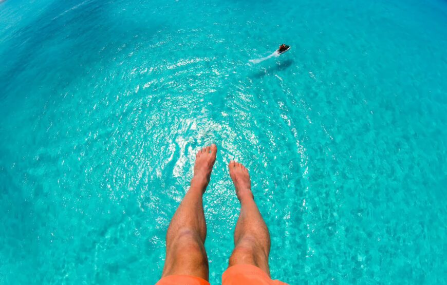 Parasail Above the Turquoise Waters of Cabbage Beach